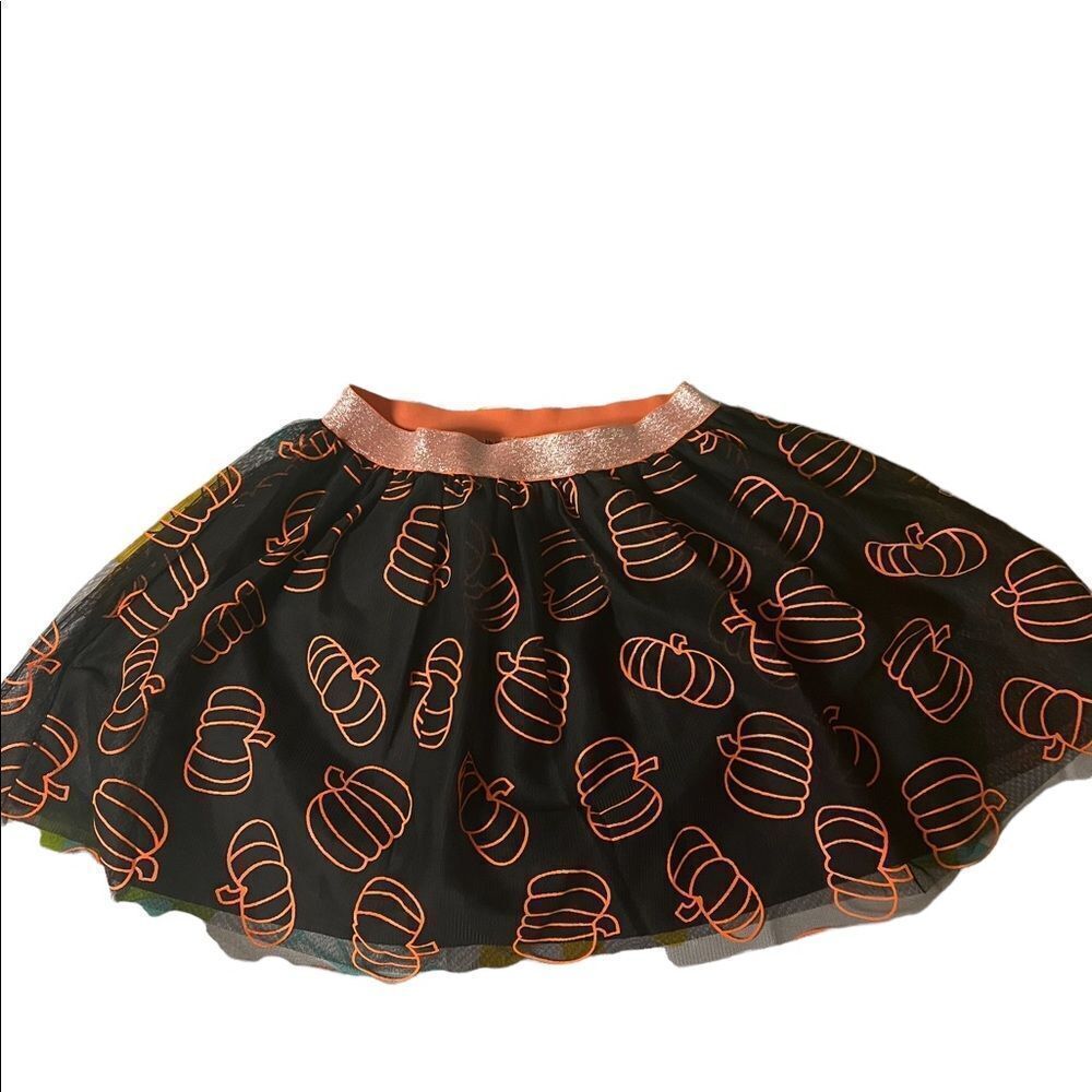 Black tutu orange pumpkins adorn this adorable fall Cat & Jack skirt
